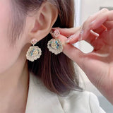 AndQ【The Feather of the Flower】Pistil Zircon Like Feather Earrings