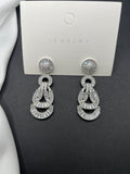 AndQ Ribbon Knot Zircon Embedded Earrings