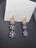 AndQ Four Flowers Zircon Embedded Earrings